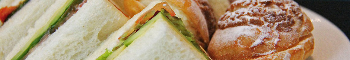 Eating American (New) Sandwich at Gourmet Gang restaurant in Chesapeake, VA.
